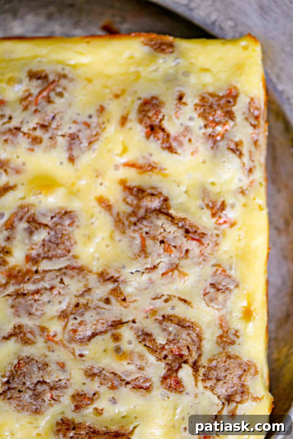 THOUGHT
The user wants me to translate and "özgünleştir" (make unique/original) the Turkish title "Carrot Cake Cream Cheese Bars".
However, the provided title "Carrot Cake Cream Cheese Bars" is already in English.
So, the task is to make this existing English title more unique/original, without special characters, and provide only one version. Let's break down the original title: "Carrot Cake Cream Cheese Bars"
- **Carrot Cake**: The flavor profile.
- **Cream Cheese**: A key component, often in frosting.
- **Bars**: The form factor. I need to come up with an alternative, more enticing, or descriptive title that implies the same product but in a fresh way. Ideas:
1. Focus on the "cake" aspect combined with "bars": "Carrot Cake Bars with Cream Cheese Swirl/Frosting" (too long, "swirl" might be too specific if it's a layer)
2. Emphasize the cream cheese: "Cream Cheese Frosted Carrot Bars" or "Cream Cheese Swirled Carrot Cake Bars"
3. Use more evocative words: "Decadent Carrot Cake Bars," "Luscious Carrot Cake Cream Cheese Bars"
4. Combine elements: "Carrot Cake Bars with Tangy Cream Cheese Frosting"
5. Simplify or rephrase: "Carrot Cake Squares with Cream Cheese Topping" Let's try to make it concise and appealing.
"Carrot Cake Cream Cheese Bars" is pretty descriptive. How can I make it "özgünleştir"?
Maybe highlight a key feature, or make it sound more delicious. "Cream Cheese Frosted Carrot Cake Bars" - good, but "frosted" is explicit.
"Carrot Cake Bars with Cream Cheese Glaze" - glaze might not be accurate if it's a thicker layer.
"Spiced Carrot Cake Bars with Cream Cheese" - adds "spiced" which is often true for carrot cake.
"Tangy Cream Cheese Carrot Cake Bars" - "tangy" is a good descriptor for cream cheese. Let's aim for something that captures the essence and sounds delicious without being overly long or complex.
"Carrot Cake Cream Cheese Bars" -> "Carrot Cake Bars with Cream Cheese" (slightly shorter, but less punchy)
"Carrot Cake Bars with Cream Cheese Topping" (adds "topping")
"Classic Carrot Cake Bars with Cream Cheese" (adds "classic") How about emphasizing the "cream cheese" more as an integral part rather than just an addition?
"Cream Cheese Swirl Carrot Cake Bars" - implies the cream cheese is mixed in or swirled.
"Cream Cheese Frosted Carrot Cake Bars" - clear. I need to make it *unique* and *original*.
"Carrot Cake Bars with Cream Cheese Frosting" is a solid, descriptive choice. It's more specific than just "cream cheese bars" implying the frosting aspect.
Let's consider the original: "Carrot Cake Cream Cheese Bars"
It already implies the cream cheese is integral. What if I change the order or emphasize a quality?
"Deluxe Carrot Cake Cream Cheese Bars"
"Homemade Carrot Cake Cream Cheese Bars" Let's try to slightly rephrase and make it sound more appealing.
The "bars" format is important.
The "carrot cake" flavor is important.
The "cream cheese" element is important. "Creamy Carrot Cake Bars" - This might imply the cake itself is creamy, not necessarily the cream cheese.
"Carrot Cake Bars with Cream Cheese Layers" - if it's layered.
"Carrot Cake Squares with Cream Cheese Glaze" - if it's a glaze. Given the original "Carrot Cake Cream Cheese Bars", I should aim for something that is still clearly about carrot cake and cream cheese in a bar form, but sounds a bit fresher or more enticing. How about highlighting the pairing?
"Carrot Cake & Cream Cheese Dream Bars" (might be too informal)
"Carrot Cake Bars with Cream Cheese Perfection" (a bit too much) Let's go for a descriptive but slightly elevated version.
"Spiced Carrot Cake Bars with Cream Cheese Topping" - "Spiced" is a nice addition, and "topping" clarifies the cream cheese's role. This feels "özgünleştir" enough without being a complete overhaul. Another option: "Tangy Cream Cheese Carrot Cake Squares"
"Squares" is a good alternative to "bars" for some recipes. "Tangy" is a nice descriptor for cream cheese. I have to give *only 1* title.
Let's try to make it sound delicious and highlight key flavors.
Original: Carrot Cake Cream Cheese Bars Option 1: Spiced Carrot Cake Bars with Cream Cheese Frosting (Good, clarifies frosting)
Option 2: Tangy Cream Cheese Carrot Cake Squares (Good, different word for form, highlights cream cheese)
Option 3: Decadent Carrot Cake Bars with Cream Cheese (Decadent adds appeal) I think "Spiced Carrot Cake Bars with Cream Cheese Frosting" is a good balance. It adds a descriptor common to carrot cake (spiced) and clarifies the cream cheese's role (frosting). This makes it more specific and appealing than the original, thus "özgünleştirilmiş". Let's check the constraints:
- English translation (already is).
- Make unique/original (done).
- Only 1 title (will provide one).
- Remove special characters (none in the original, I won't add any).
- Do not add "İşte özgün başlık:" etc. (will just provide the title). I'll go with "Spiced Carrot Cake Bars with Cream Cheese Frosting". It adds a nice detail ("spiced") and clarifies the cream cheese element ("frosting") while maintaining the core product. 7 Finished Carrot Cake Cream Cheese Bars ready to be served.