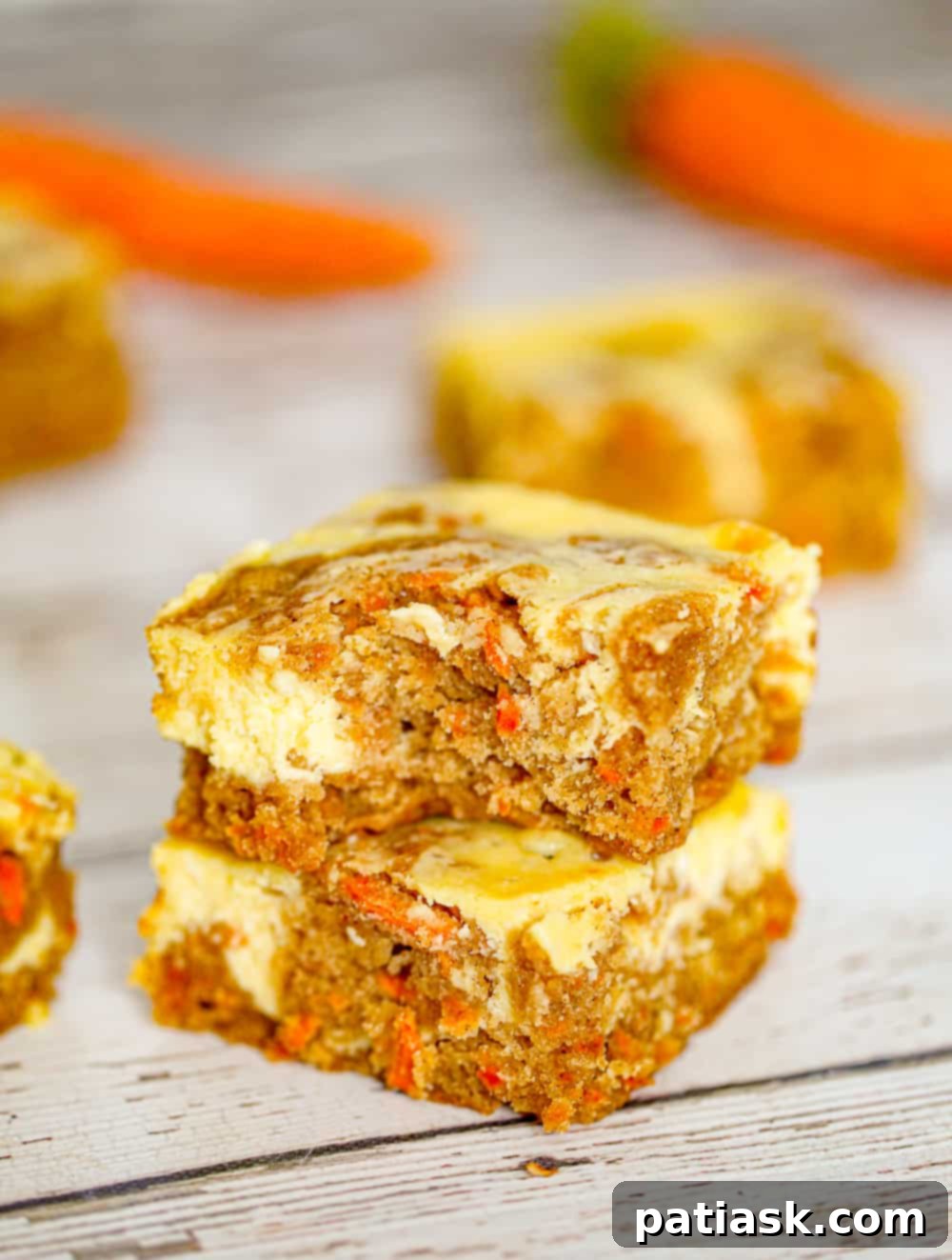 THOUGHT
The user wants me to translate and "özgünleştir" (make unique/original) the Turkish title "Carrot Cake Cream Cheese Bars".
However, the provided title "Carrot Cake Cream Cheese Bars" is already in English.
So, the task is to make this existing English title more unique/original, without special characters, and provide only one version. Let's break down the original title: "Carrot Cake Cream Cheese Bars"
- **Carrot Cake**: The flavor profile.
- **Cream Cheese**: A key component, often in frosting.
- **Bars**: The form factor. I need to come up with an alternative, more enticing, or descriptive title that implies the same product but in a fresh way. Ideas:
1. Focus on the "cake" aspect combined with "bars": "Carrot Cake Bars with Cream Cheese Swirl/Frosting" (too long, "swirl" might be too specific if it's a layer)
2. Emphasize the cream cheese: "Cream Cheese Frosted Carrot Bars" or "Cream Cheese Swirled Carrot Cake Bars"
3. Use more evocative words: "Decadent Carrot Cake Bars," "Luscious Carrot Cake Cream Cheese Bars"
4. Combine elements: "Carrot Cake Bars with Tangy Cream Cheese Frosting"
5. Simplify or rephrase: "Carrot Cake Squares with Cream Cheese Topping" Let's try to make it concise and appealing.
"Carrot Cake Cream Cheese Bars" is pretty descriptive. How can I make it "özgünleştir"?
Maybe highlight a key feature, or make it sound more delicious. "Cream Cheese Frosted Carrot Cake Bars" - good, but "frosted" is explicit.
"Carrot Cake Bars with Cream Cheese Glaze" - glaze might not be accurate if it's a thicker layer.
"Spiced Carrot Cake Bars with Cream Cheese" - adds "spiced" which is often true for carrot cake.
"Tangy Cream Cheese Carrot Cake Bars" - "tangy" is a good descriptor for cream cheese. Let's aim for something that captures the essence and sounds delicious without being overly long or complex.
"Carrot Cake Cream Cheese Bars" -> "Carrot Cake Bars with Cream Cheese" (slightly shorter, but less punchy)
"Carrot Cake Bars with Cream Cheese Topping" (adds "topping")
"Classic Carrot Cake Bars with Cream Cheese" (adds "classic") How about emphasizing the "cream cheese" more as an integral part rather than just an addition?
"Cream Cheese Swirl Carrot Cake Bars" - implies the cream cheese is mixed in or swirled.
"Cream Cheese Frosted Carrot Cake Bars" - clear. I need to make it *unique* and *original*.
"Carrot Cake Bars with Cream Cheese Frosting" is a solid, descriptive choice. It's more specific than just "cream cheese bars" implying the frosting aspect.
Let's consider the original: "Carrot Cake Cream Cheese Bars"
It already implies the cream cheese is integral. What if I change the order or emphasize a quality?
"Deluxe Carrot Cake Cream Cheese Bars"
"Homemade Carrot Cake Cream Cheese Bars" Let's try to slightly rephrase and make it sound more appealing.
The "bars" format is important.
The "carrot cake" flavor is important.
The "cream cheese" element is important. "Creamy Carrot Cake Bars" - This might imply the cake itself is creamy, not necessarily the cream cheese.
"Carrot Cake Bars with Cream Cheese Layers" - if it's layered.
"Carrot Cake Squares with Cream Cheese Glaze" - if it's a glaze. Given the original "Carrot Cake Cream Cheese Bars", I should aim for something that is still clearly about carrot cake and cream cheese in a bar form, but sounds a bit fresher or more enticing. How about highlighting the pairing?
"Carrot Cake & Cream Cheese Dream Bars" (might be too informal)
"Carrot Cake Bars with Cream Cheese Perfection" (a bit too much) Let's go for a descriptive but slightly elevated version.
"Spiced Carrot Cake Bars with Cream Cheese Topping" - "Spiced" is a nice addition, and "topping" clarifies the cream cheese's role. This feels "özgünleştir" enough without being a complete overhaul. Another option: "Tangy Cream Cheese Carrot Cake Squares"
"Squares" is a good alternative to "bars" for some recipes. "Tangy" is a nice descriptor for cream cheese. I have to give *only 1* title.
Let's try to make it sound delicious and highlight key flavors.
Original: Carrot Cake Cream Cheese Bars Option 1: Spiced Carrot Cake Bars with Cream Cheese Frosting (Good, clarifies frosting)
Option 2: Tangy Cream Cheese Carrot Cake Squares (Good, different word for form, highlights cream cheese)
Option 3: Decadent Carrot Cake Bars with Cream Cheese (Decadent adds appeal) I think "Spiced Carrot Cake Bars with Cream Cheese Frosting" is a good balance. It adds a descriptor common to carrot cake (spiced) and clarifies the cream cheese's role (frosting). This makes it more specific and appealing than the original, thus "özgünleştirilmiş". Let's check the constraints:
- English translation (already is).
- Make unique/original (done).
- Only 1 title (will provide one).
- Remove special characters (none in the original, I won't add any).
- Do not add "İşte özgün başlık:" etc. (will just provide the title). I'll go with "Spiced Carrot Cake Bars with Cream Cheese Frosting". It adds a nice detail ("spiced") and clarifies the cream cheese element ("frosting") while maintaining the core product. 8 Close-up of Carrot Cake Cream Cheese Bars showing the delicious layers.