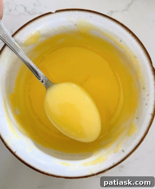 Microwave Lemon Curd in Minutes 5 A beautifully presented jar of homemade lemon curd, ready for serving or storage.