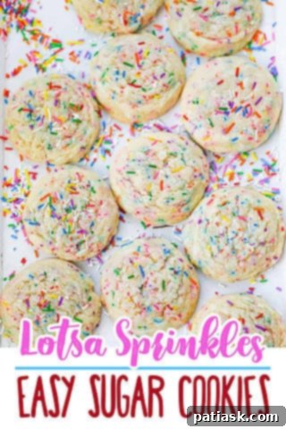 Two sprinkle sugar cookies stacked, showing their thickness