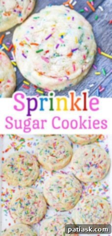 An array of colorful sprinkle sugar cookies on a baking sheet