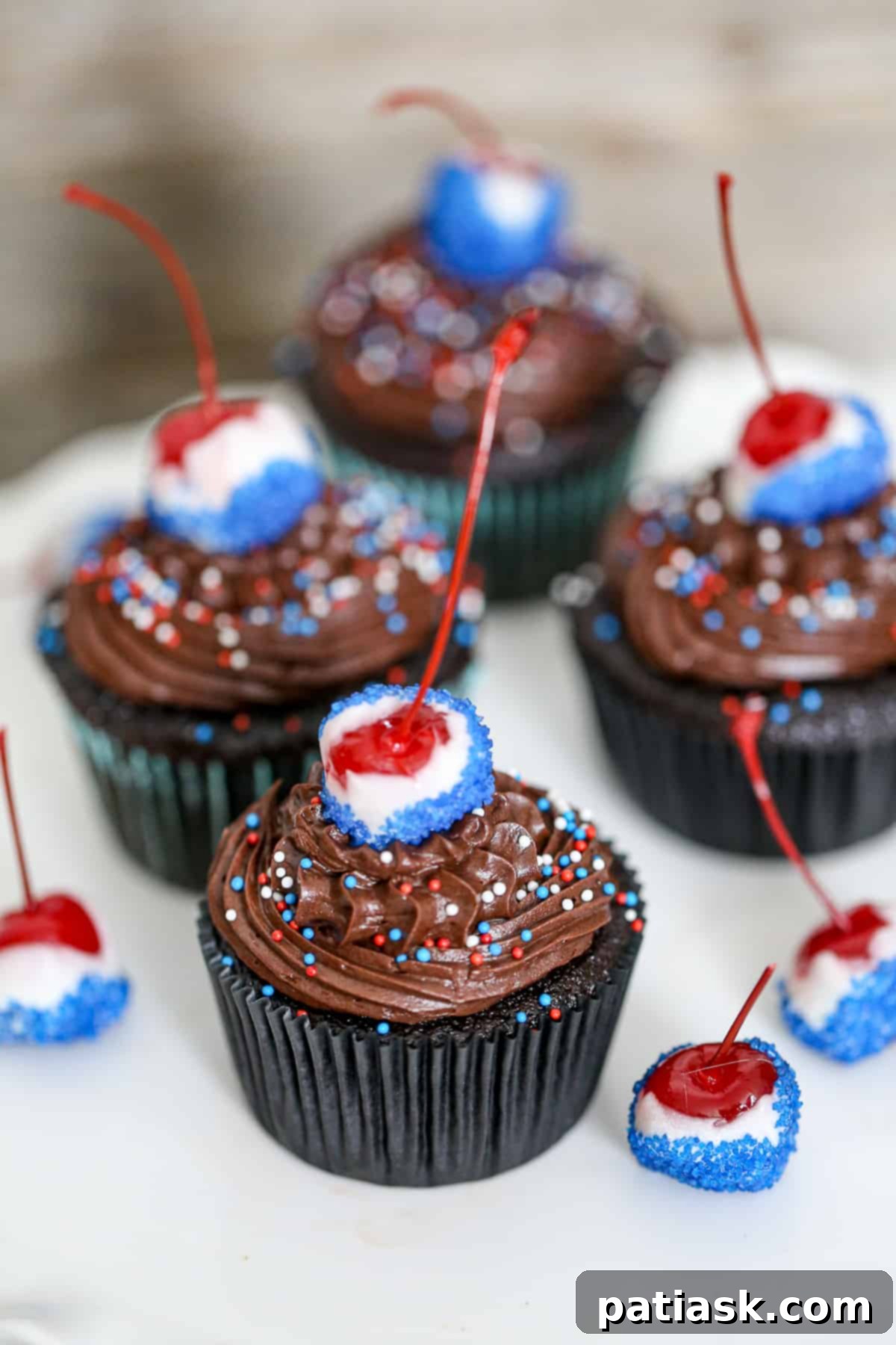 Patriotic Cherry Bomb Cupcakes 3 Delicious 4th of July Cherry Bomb Cupcakes decorated for Independence Day