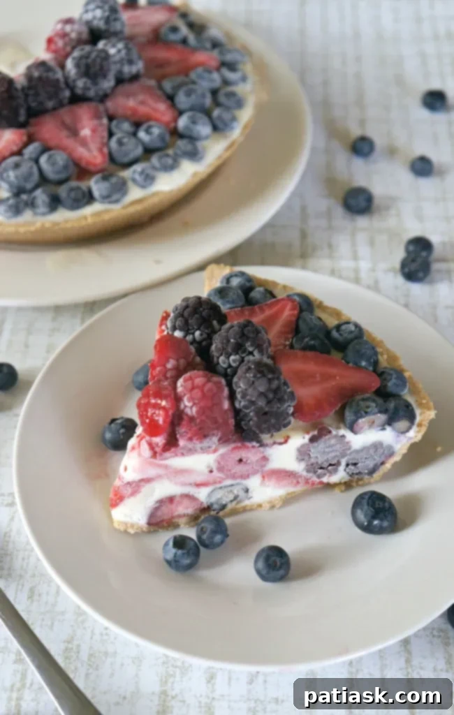 50 Sublime Ice Cream Treats to Savor This Summer 28 Easy Frozen Mixed Berry Custard Pie Recipe, a delicious summer dessert.