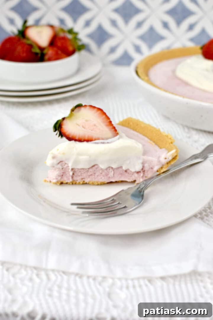 50 Sublime Ice Cream Treats to Savor This Summer 30 A slice of frozen strawberry pie, looking fresh and delicious.