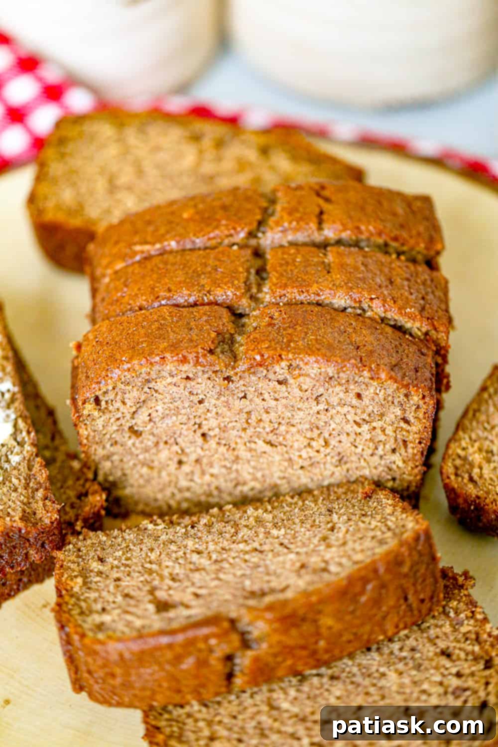 Cozy Apple Cinnamon Bread 9 Close-up of a slice of cinnamon apple bread with a moist interior