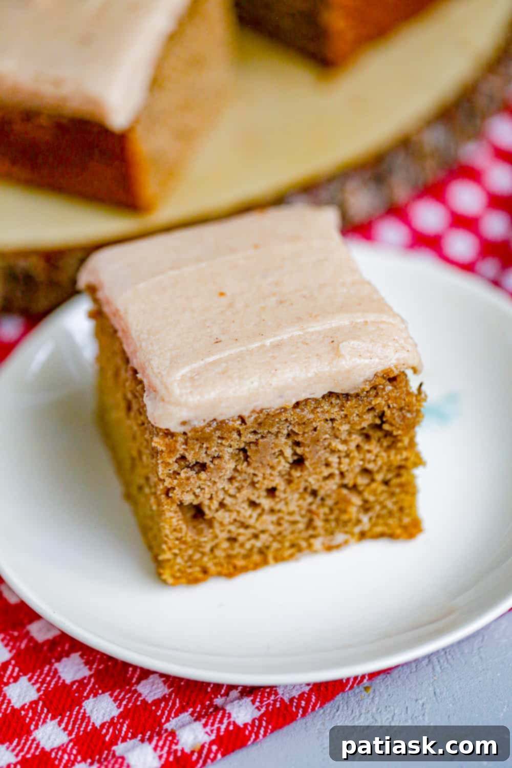 slice of apple spice cake with apple butter