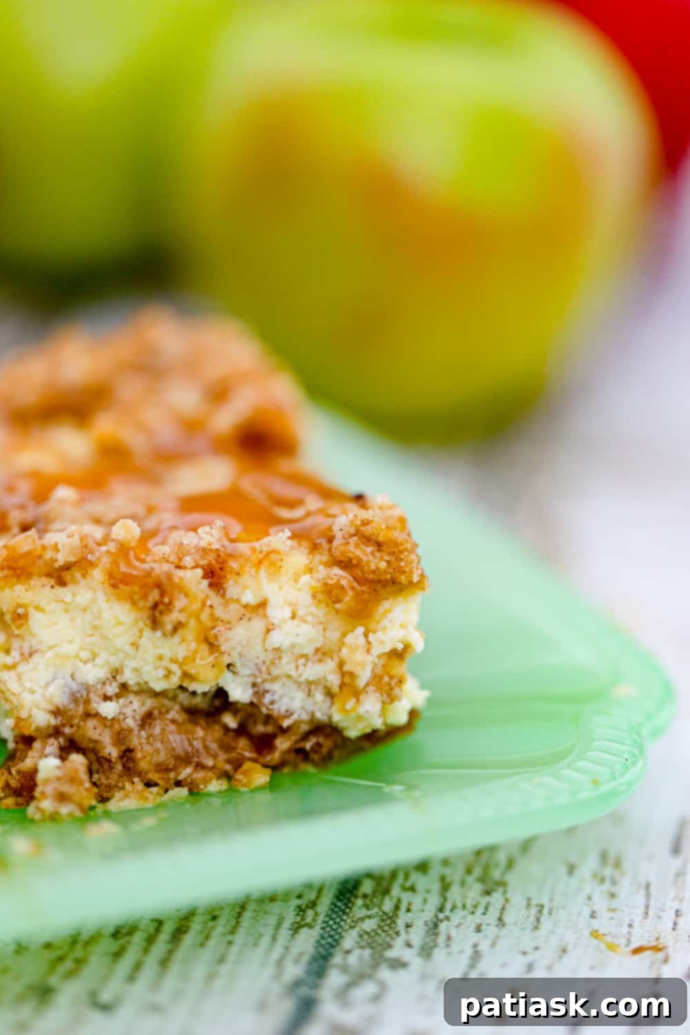 Autumn Apple Crumble Cheesecake Squares 6 Finished Apple Crisp Cream Cheese Bars, perfectly sliced and ready to serve