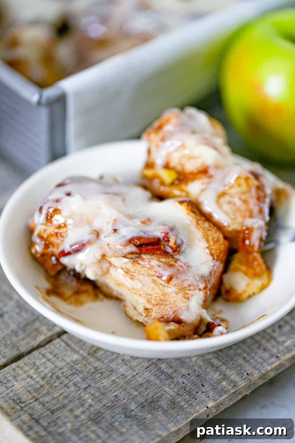 Apple Cinnamon Pull Apart Biscuits 3 Easy Apple Cinnamon Biscuit Bake drenched in cream cheese icing