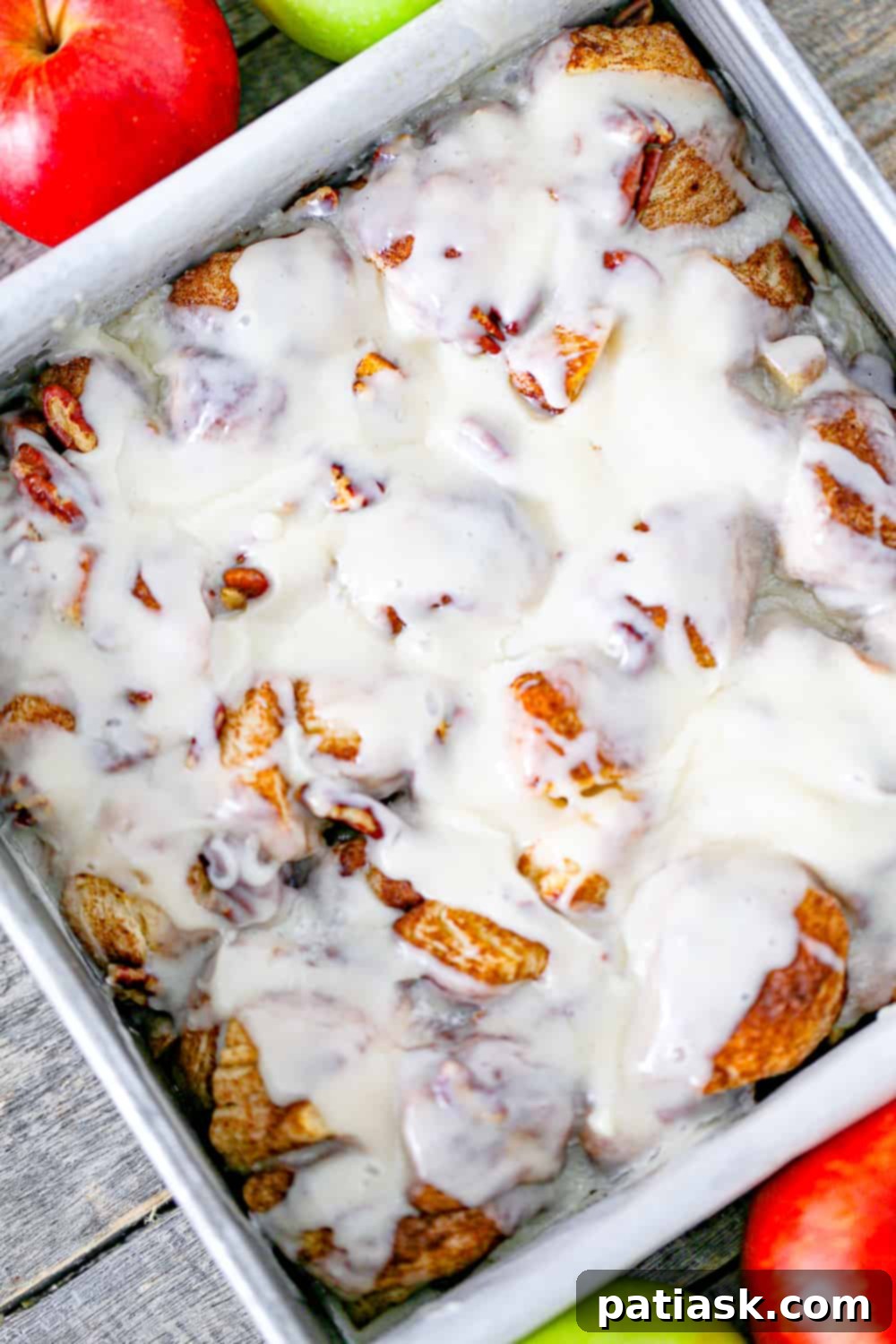 Apple Cinnamon Pull Apart Biscuits 4 Easy Apple Cinnamon Biscuit Bake in a baking pan, ready to be glazed