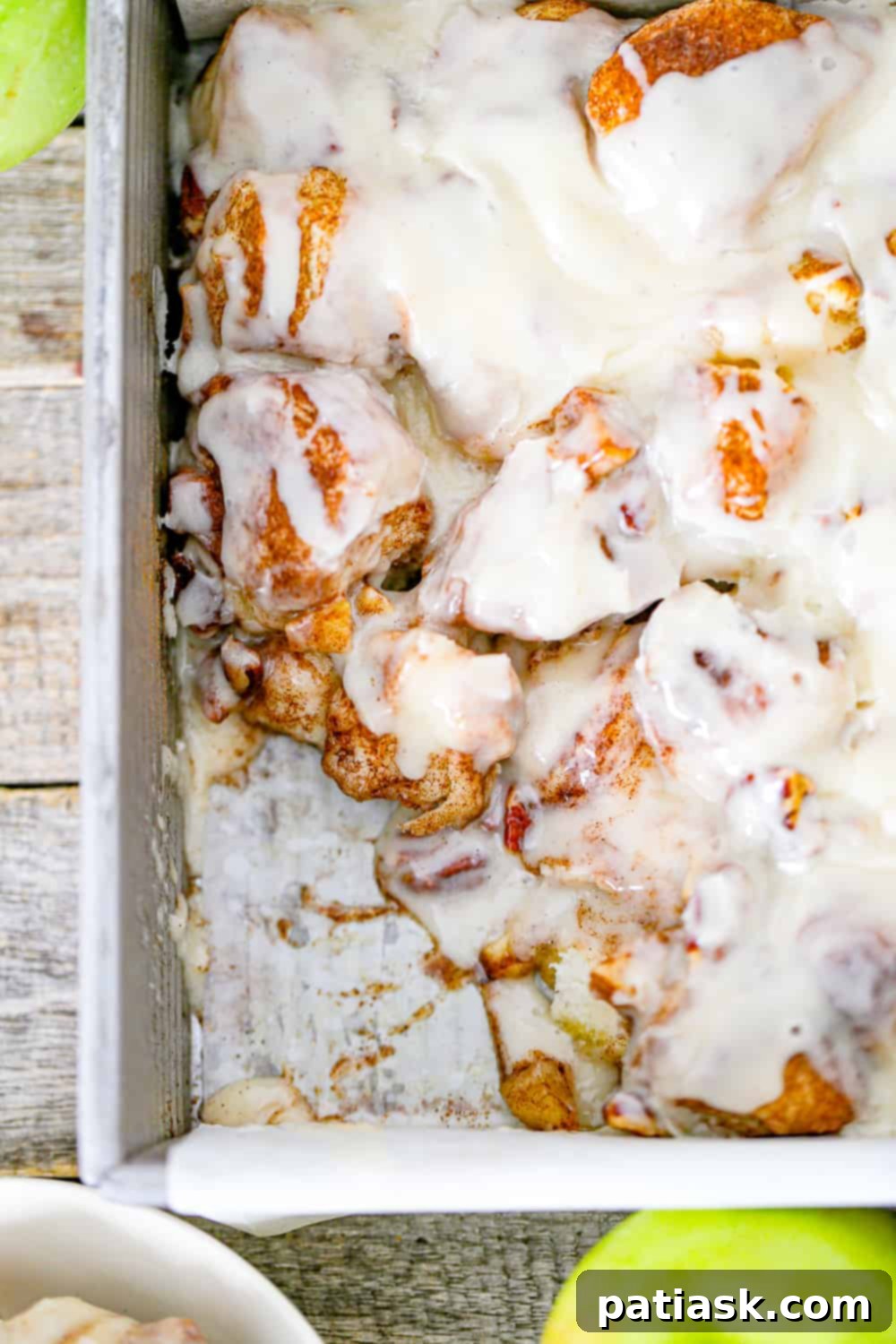 Apple Cinnamon Pull Apart Biscuits 5 Gooey Apple Cinnamon Biscuit Bake with melted cream cheese icing