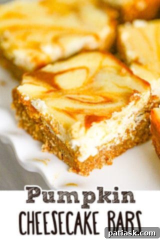 Effortless Pumpkin Cheesecake Bars 9 Pumpkin Cheesecake Bars ready to be served for a fall gathering.