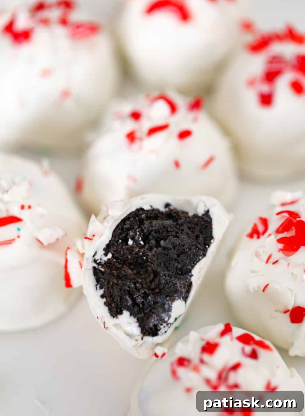 Crushed Peppermint Oreo Delights 7 Platter of perfectly formed and decorated Christmas Peppermint Oreo Truffles