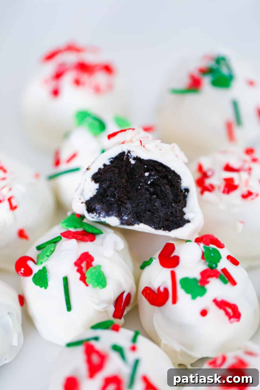 Crushed Peppermint Oreo Delights 4 Piles of crushed candy canes and other holiday sprinkles for decorating truffles