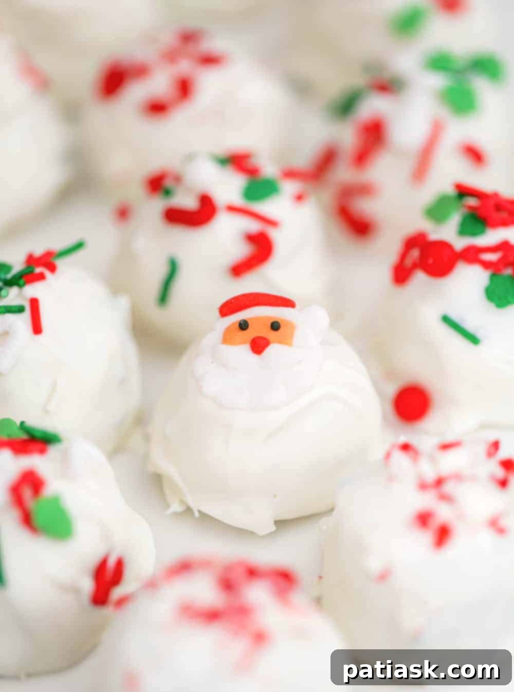 Crushed Peppermint Oreo Delights 5 A festive platter of Christmas Peppermint Oreo Truffles decorated with candy cane pieces