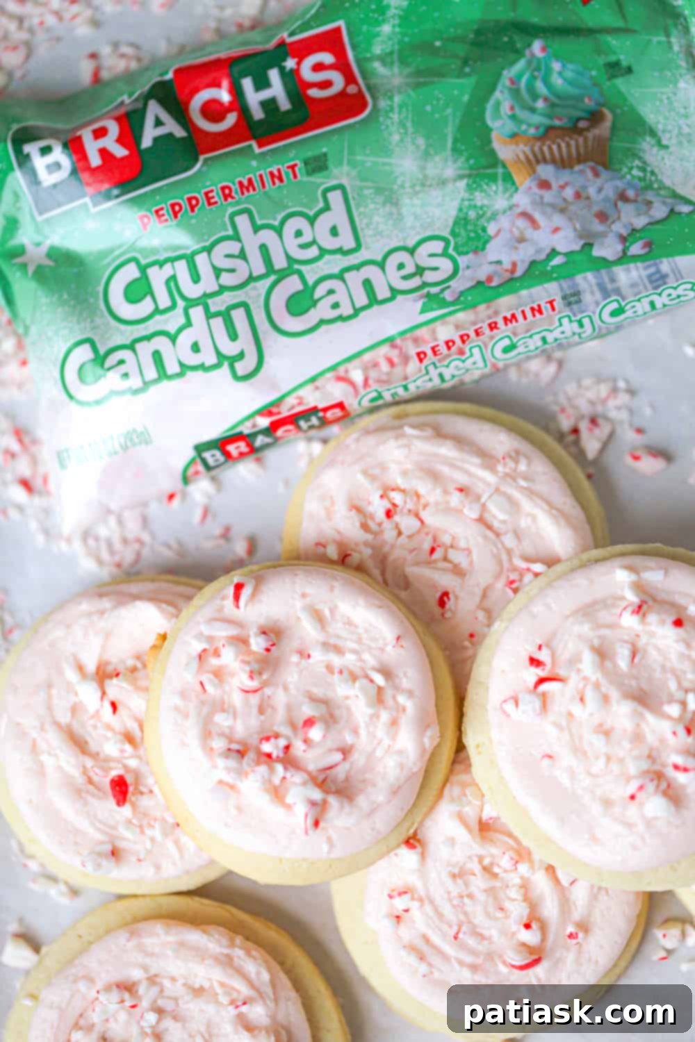 Peppermint Swirl Cookies 5 Frosted candy cane sugar cookies, beautifully decorated with red frosting and crushed candy canes.