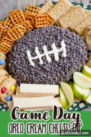 Oreo Cookies & Cream Football Dip surrounded by various dippers