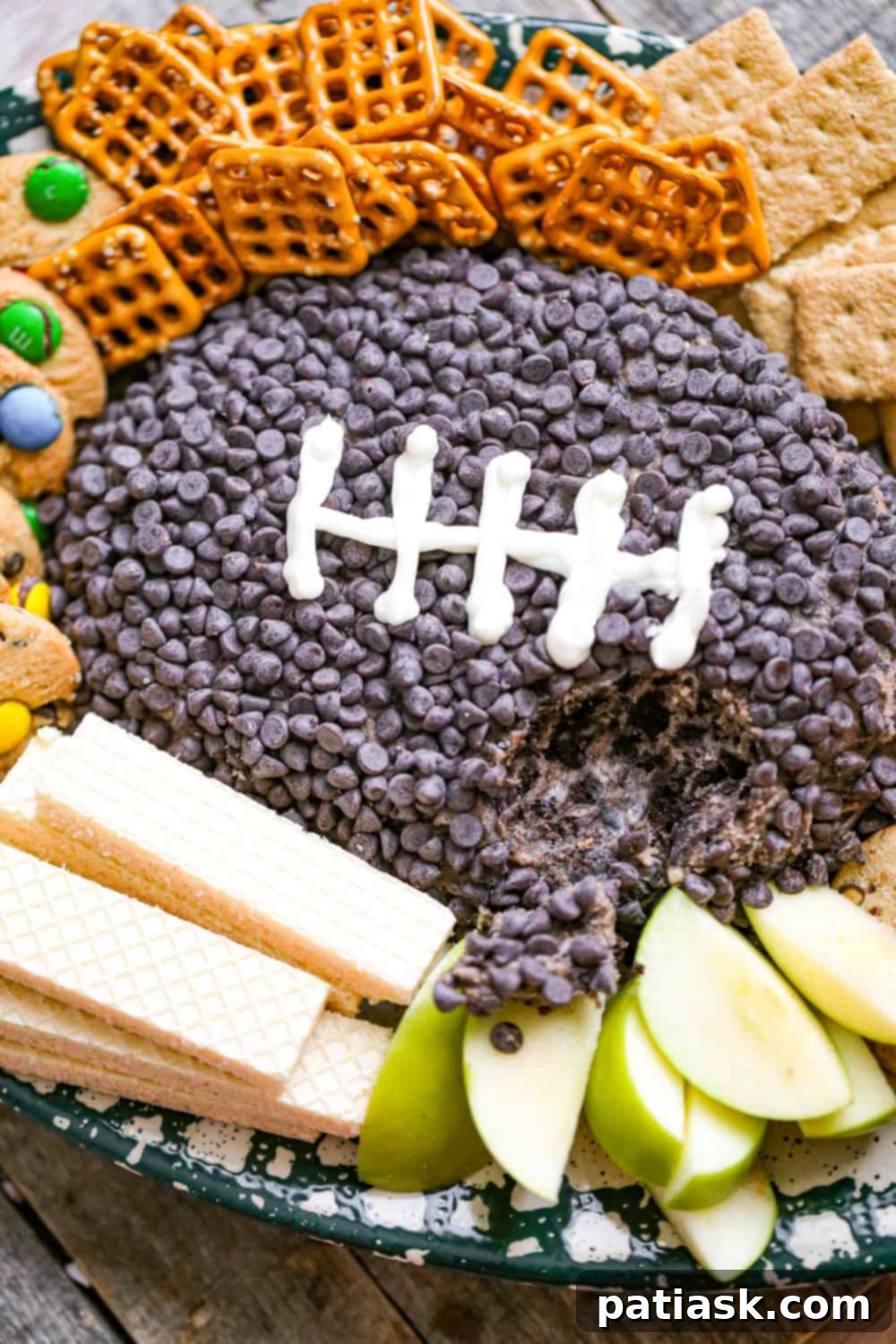 Beautifully decorated Oreo cream cheese football dip, ready for a party