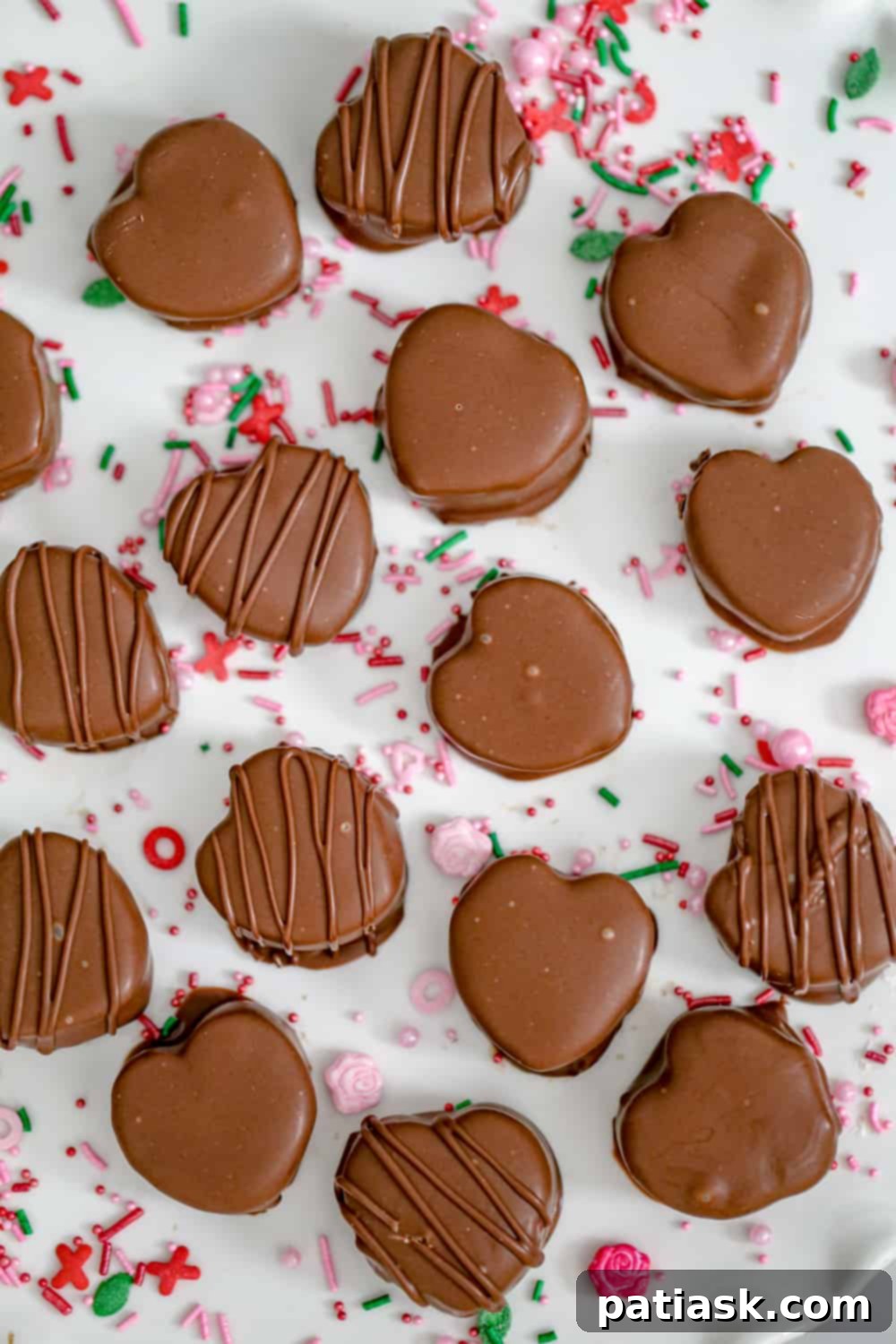 Valentine's Peanut Butter Chocolate Kisses 8 Another perspective of Valentine's peanut butter hearts, showcasing their perfect heart shape and smooth chocolate coating