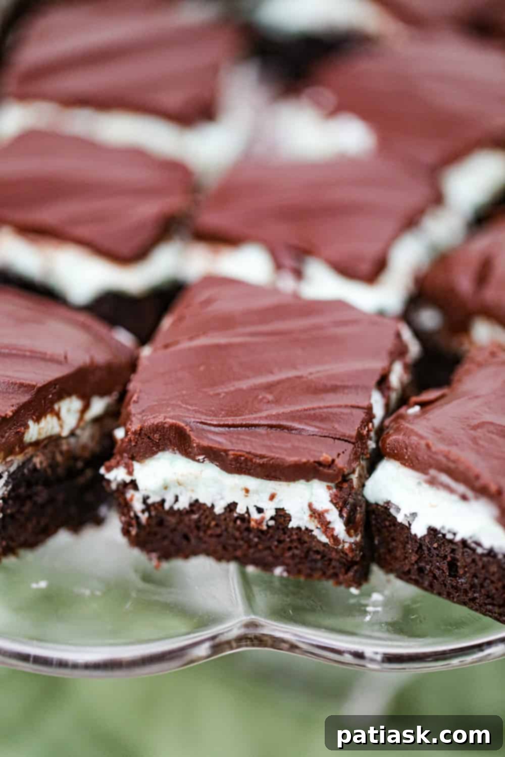 Cool Mint Chocolate Brownie Stack 8 Easy chocolate mint brownies presented in a glass baking dish, ready to serve.