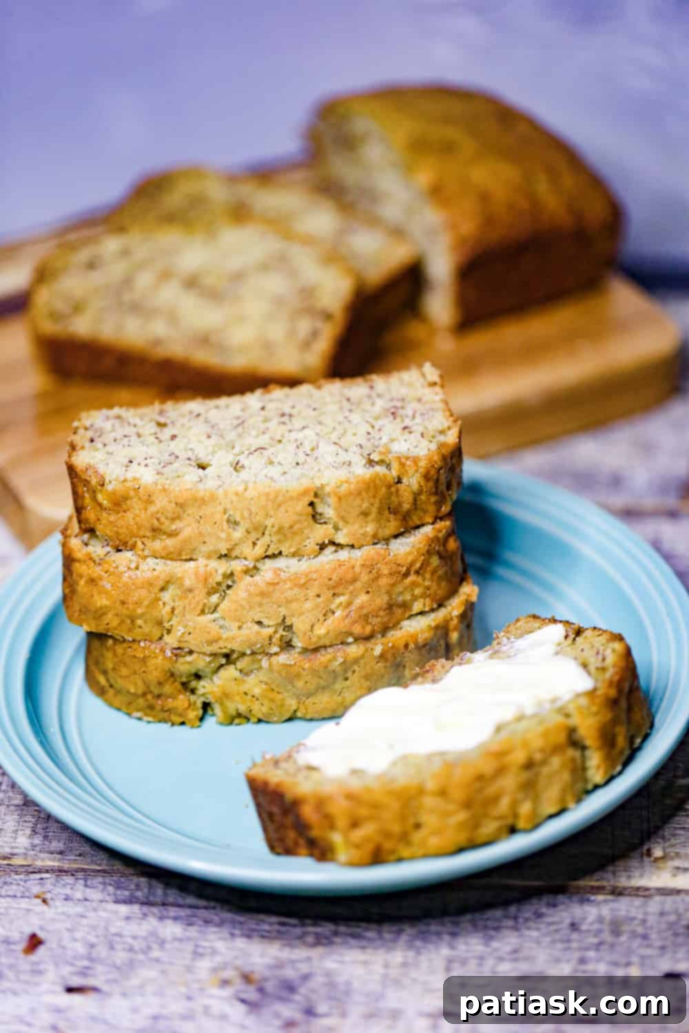 The Easiest Banana Bread Ever 5 moist banana bread recipe, sliced and ready to eat