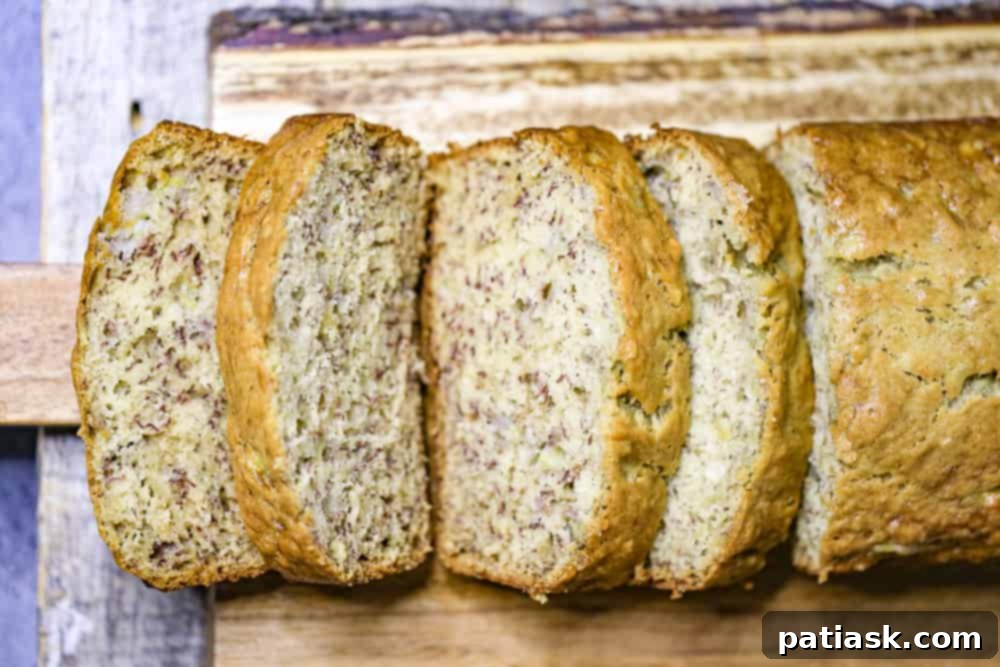 Super Easy Banana Bread Recipe! close up of a slice