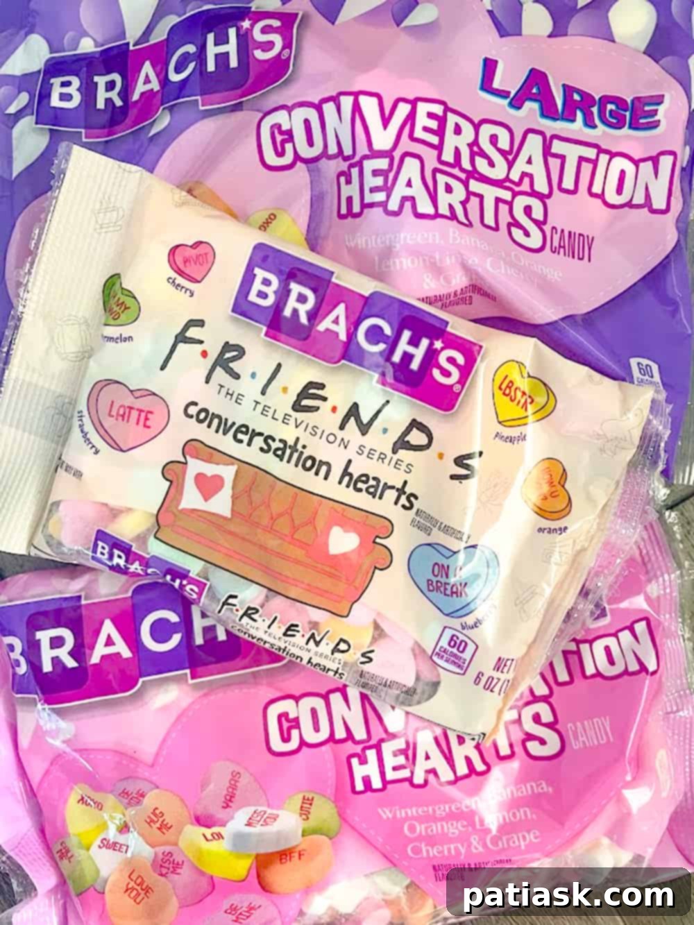 Strawberry Cream Jell-O Delights 3 conversation hearts on truffles, close-up of conversation heart candy