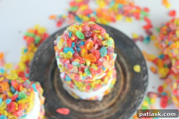 Crunchy Fruity Pebbles Ice Cream Sandwiches 5 Fruity Pebbles Ice Cream Sandwiches - On a serving plate