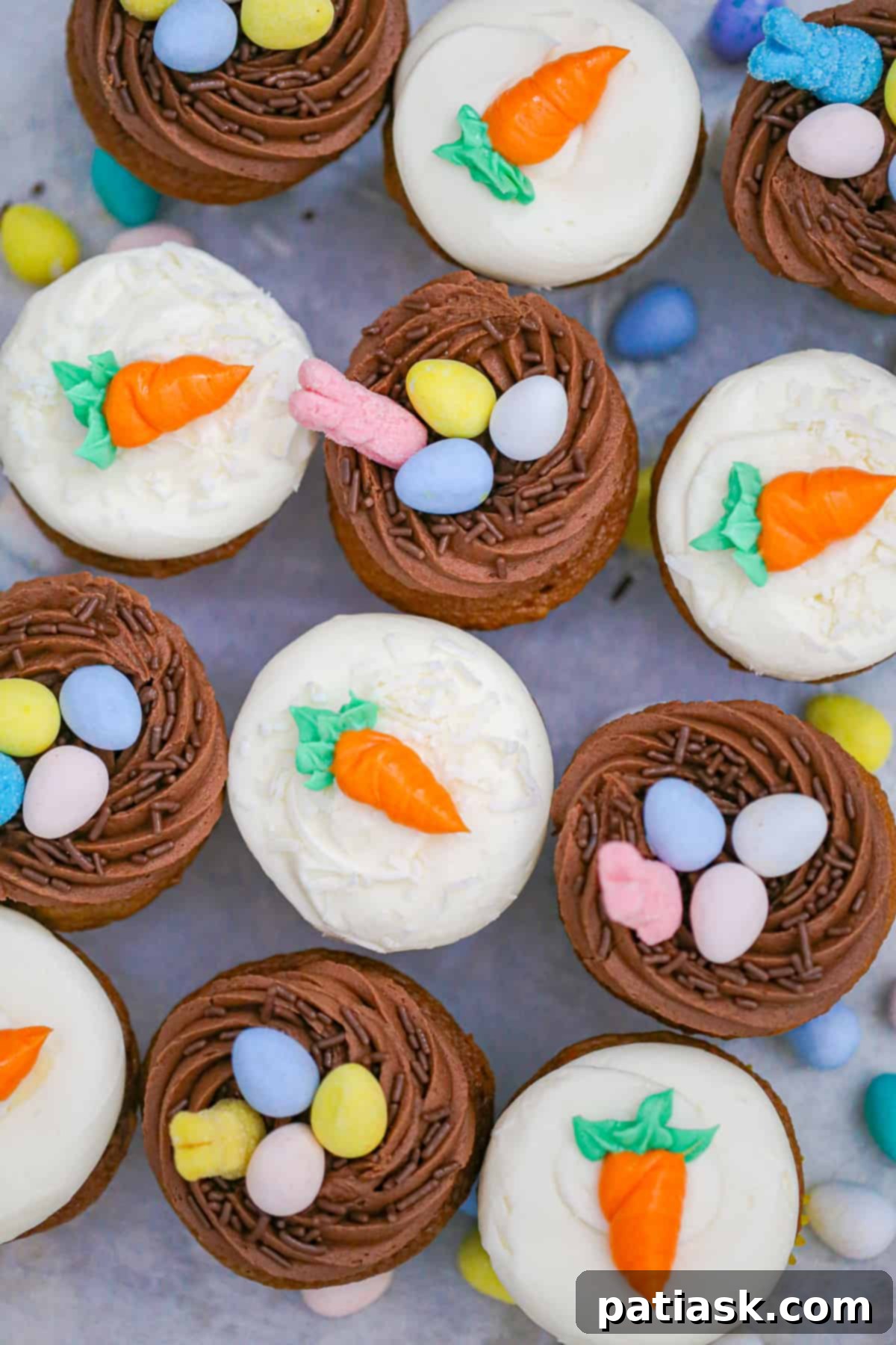 Close-up of a frosted carrot cake cupcake, showing rich texture
