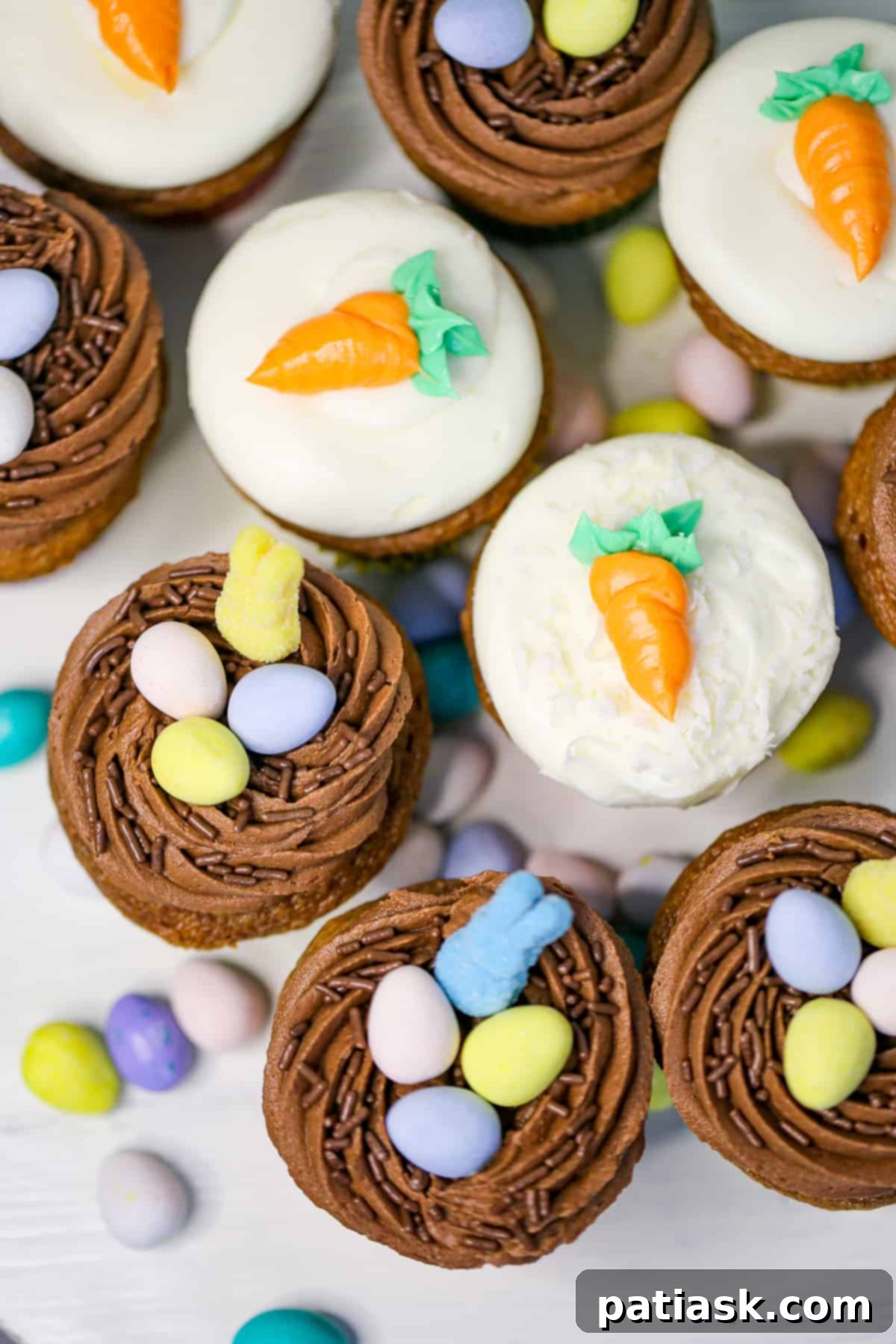 carrot cake cupcake recipe decorated with frosting carrots