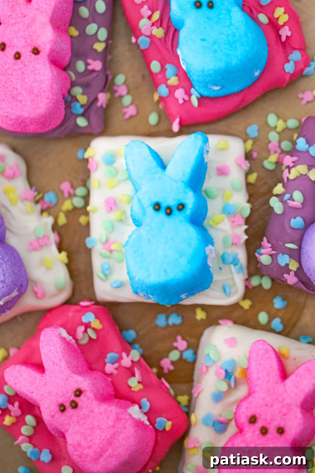 Stack of homemade chocolate graham crackers for Easter with colorful Peeps