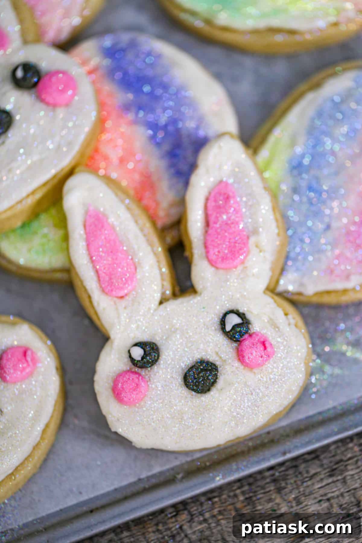 Whimsical Easter Bunny Cookies 2 Adorable Easter Bunny Sugar Cookies decorated with pastel frosting and sprinkles, perfect for holiday celebrations.