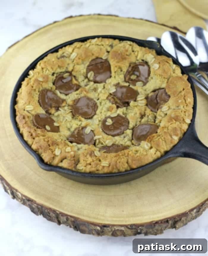 Decadent Peanut Butter Cup Skillet Cookie 4 Skillet cookie recipe with peanut butter cups and chocolate chips