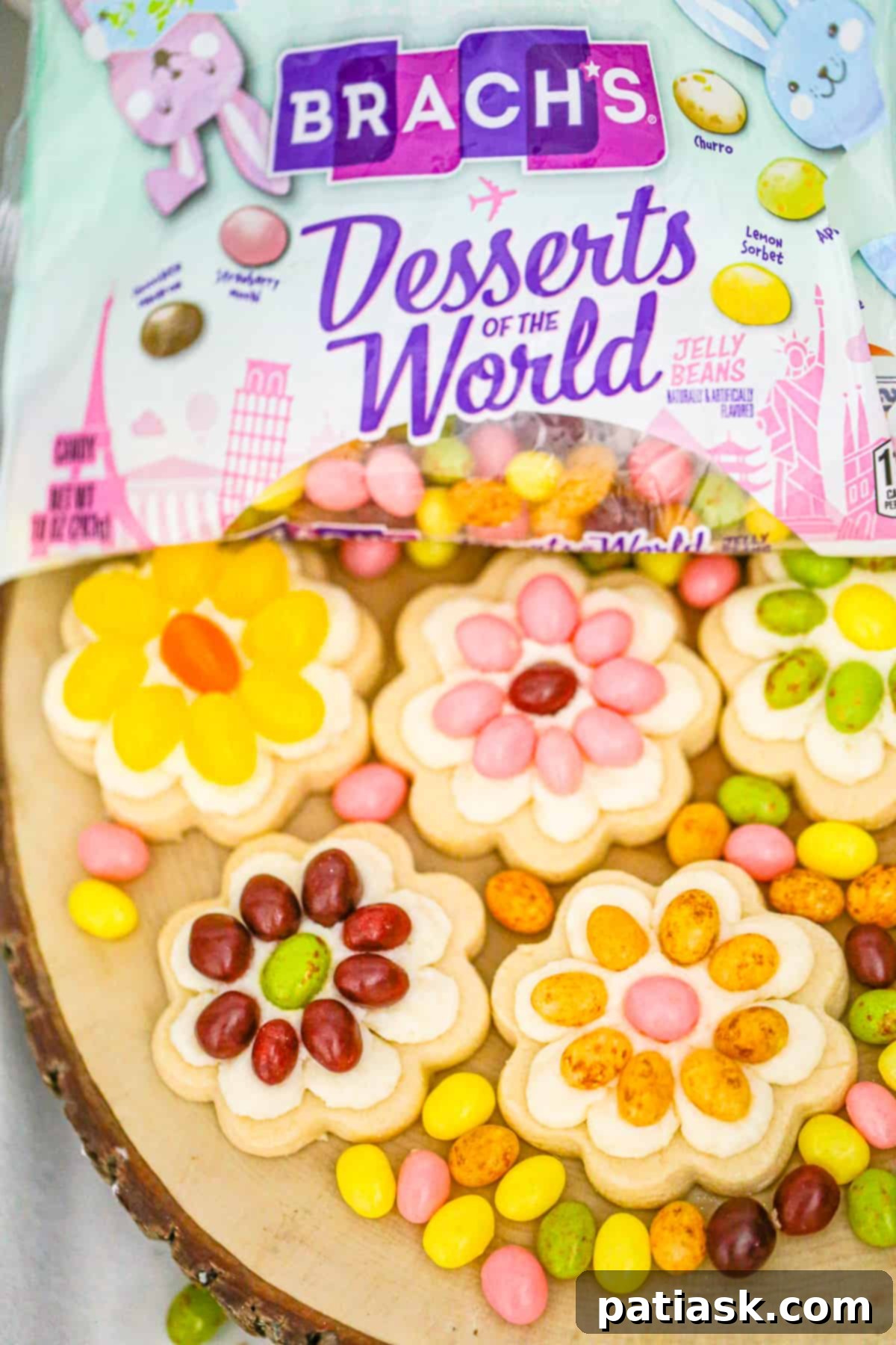 Rainbow Jelly Bean Easter Cookies 8 Everyone loves to indulge in these colorful Easter Jelly Bean Flower Cookies topped with a simple buttercream frosting & BRACH's jelly beans!