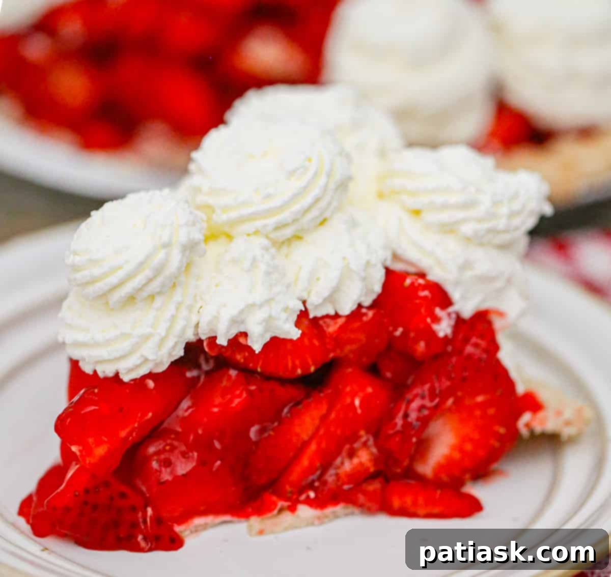 The Authentic Shoney's Strawberry Pie Copycat 8 A top-down view of an original fresh strawberry pie recipe, showcasing the neatly arranged berries and glossy glaze in a classic pie dish.