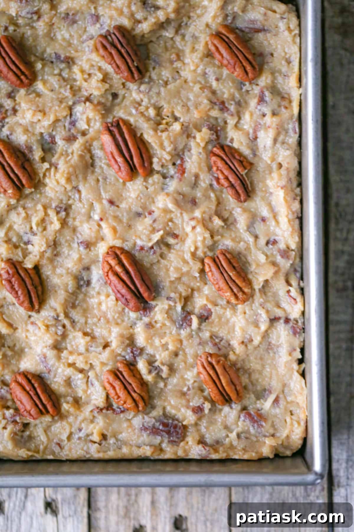 A full pan of freshly baked German Chocolate Brownies, still warm and inviting