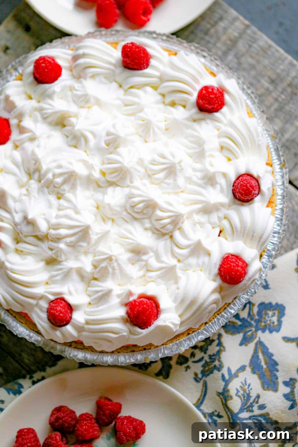 Easy 3 Ingredient Jello Cool Whip Pie 4 Close-up of a refreshing Jello Cool Whip Pie with a graham cracker crust