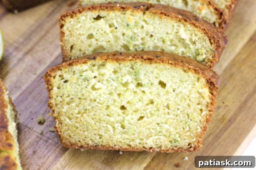 Two loaves of Lemon Zucchini Bread on a cooling rack
