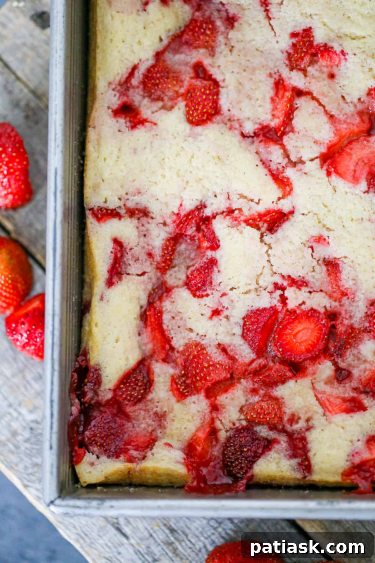 Best fresh easy homemade Strawberry Cobbler recipe close-up, highlighting the juicy strawberries and golden crust.