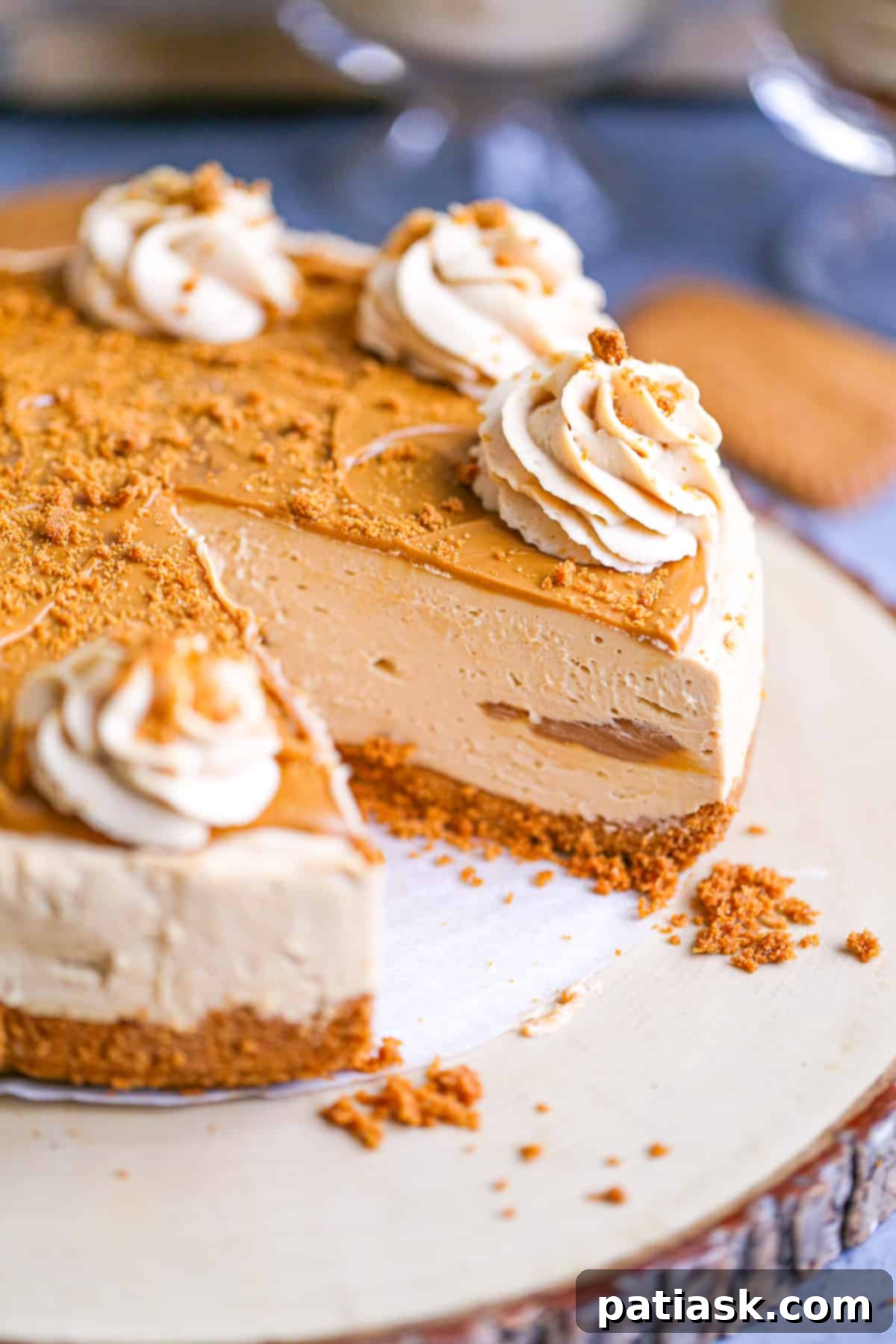 Effortless No-Bake Biscoff Cheesecake 6 A bowl filled with the creamy Biscoff cheesecake mixture, ready to be assembled