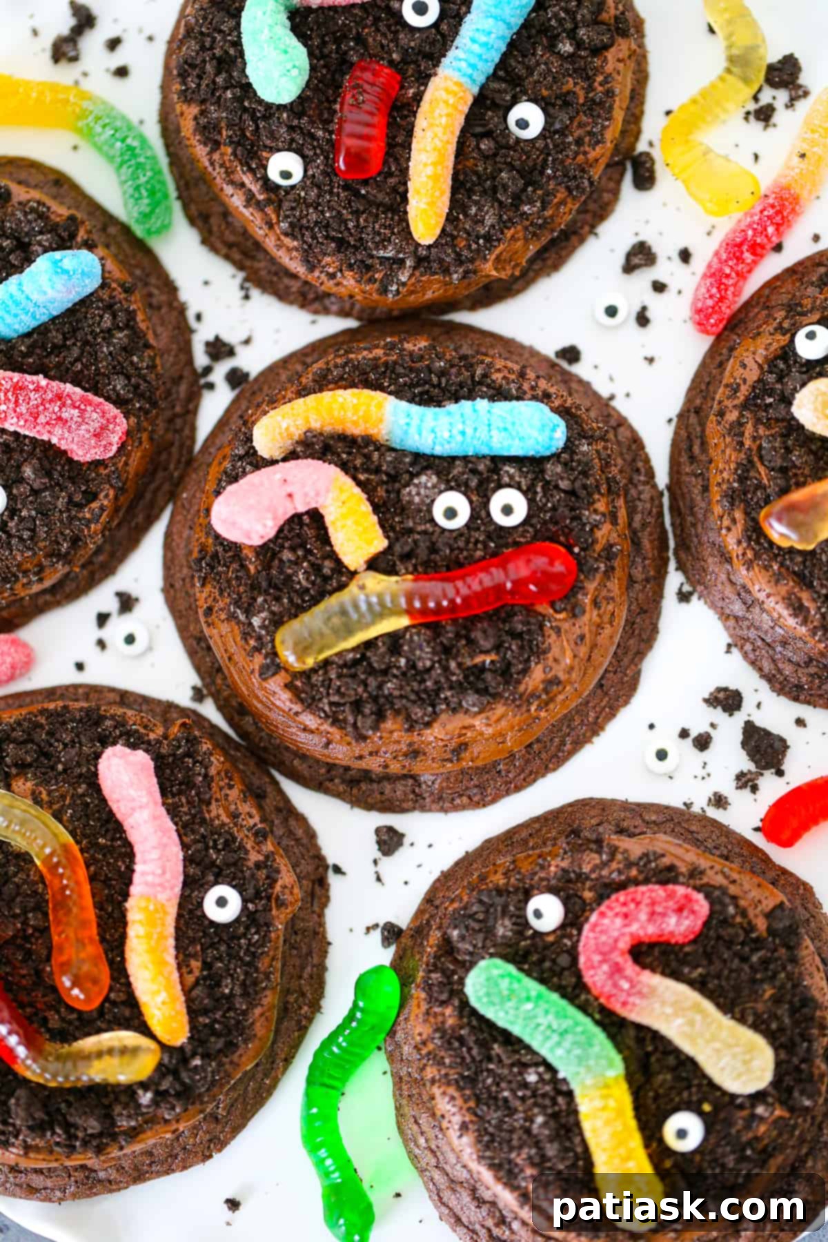 Wormy Dirt Brownie Cookies 2 Gummy Worm Dirt Brownie Cookies recipe chocolate frosting halloween dessert