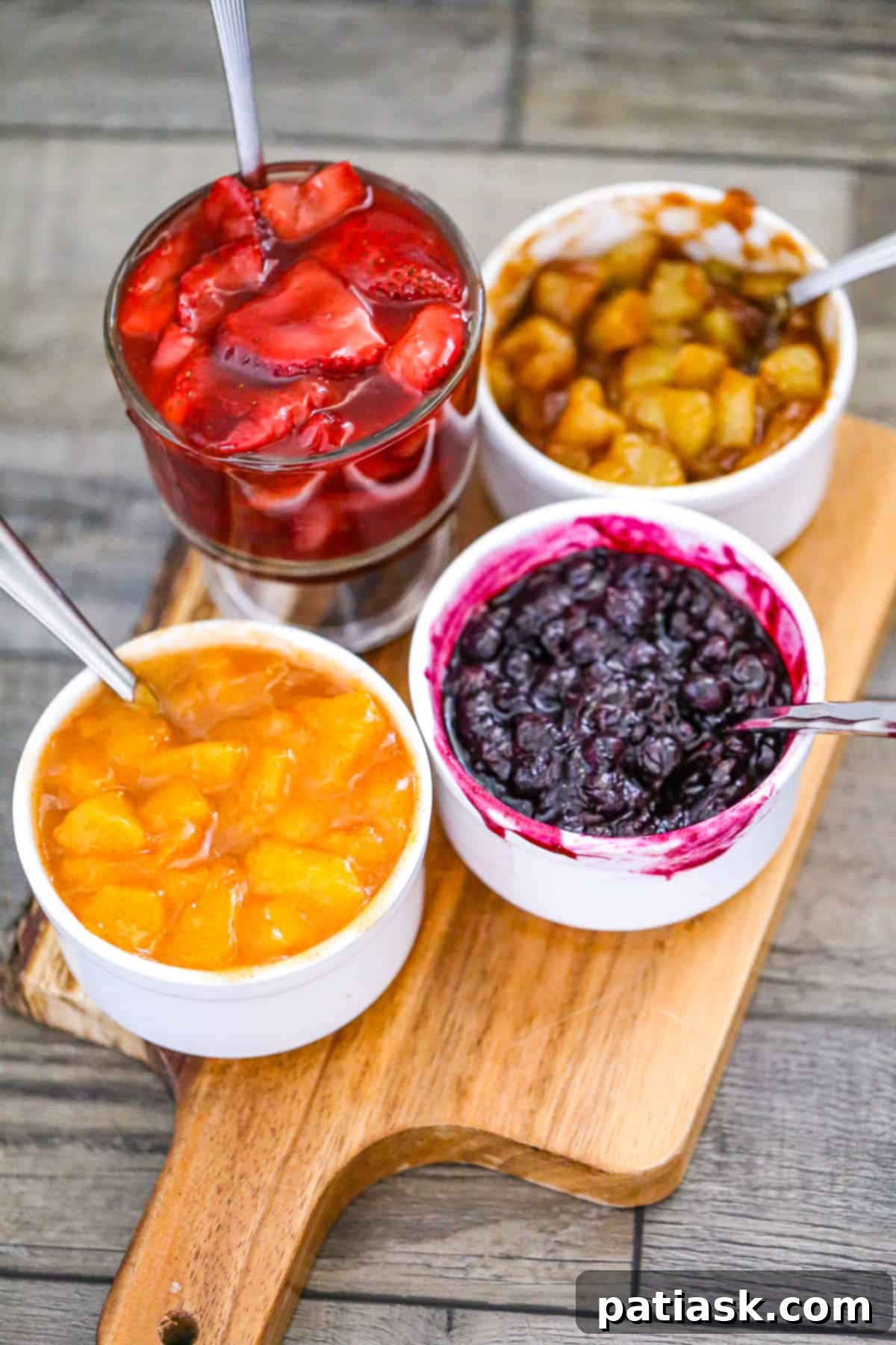 Sweet Fruit Pockets 5 easy hand held pies recipe with shortcuts apple, blueberry, cherry, peach, blueberry, raspberry fillings using pie crust and topped with glaze