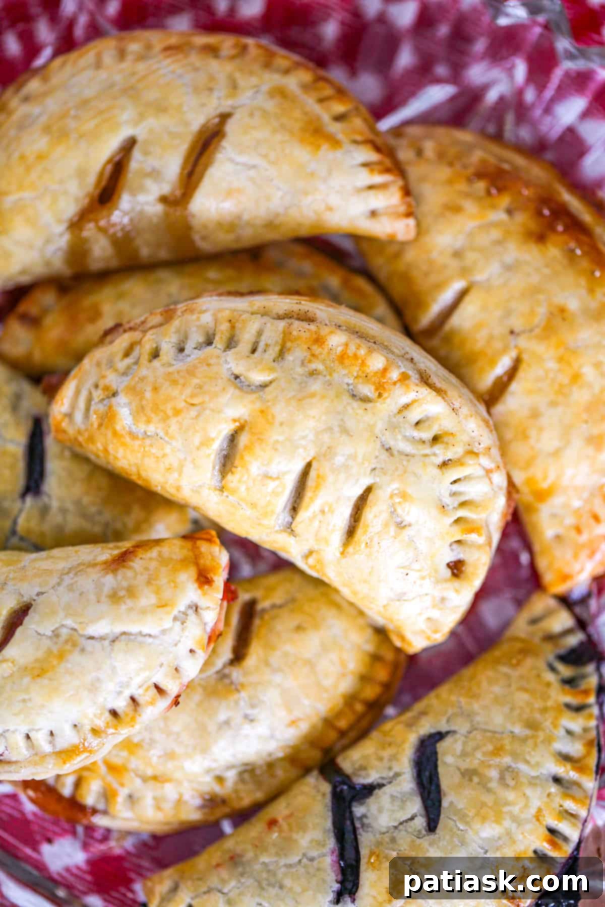 Sweet Fruit Pockets 8 apple, blueberry, cherry, peach, blueberry, raspberry fillings using pie crust and topped with glaze