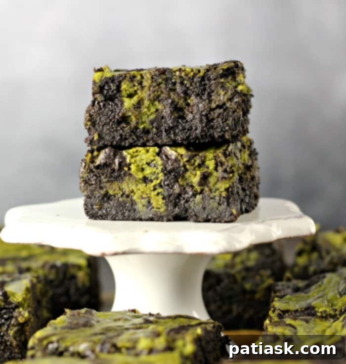 Matcha Swirl Cheesecake Brownies 2 Matcha Cheesecake Brownies - a rich dark chocolate brownie base with vibrant green matcha cheesecake swirls.