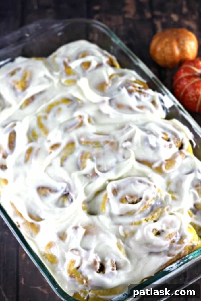 Autumn Spice Pumpkin Swirls 4 easy homemade Cinnamon Pumpkin Rolls with Cream Cheese Frosting fall baking recipe