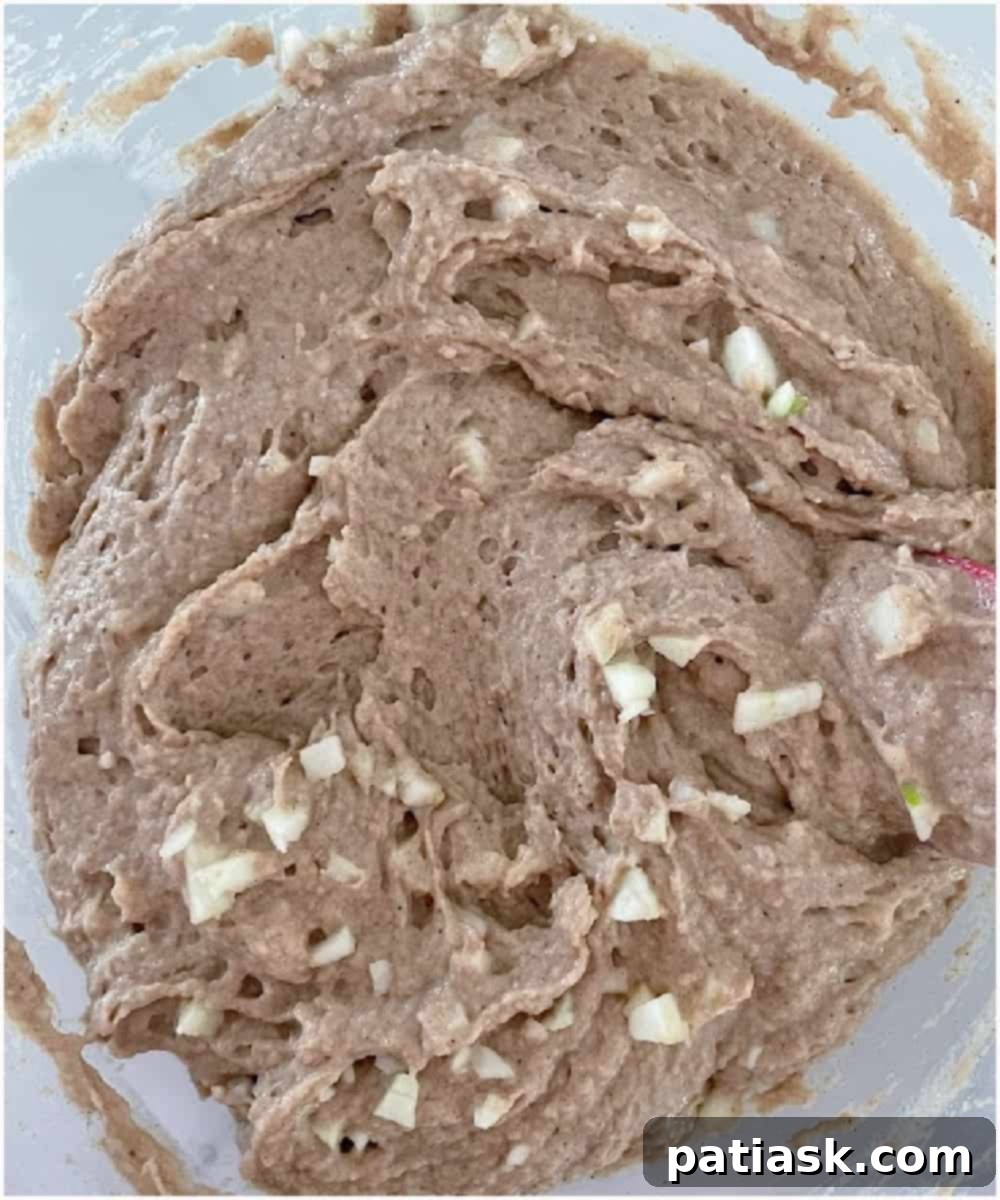 Close-up of salted caramel frosting being mixed