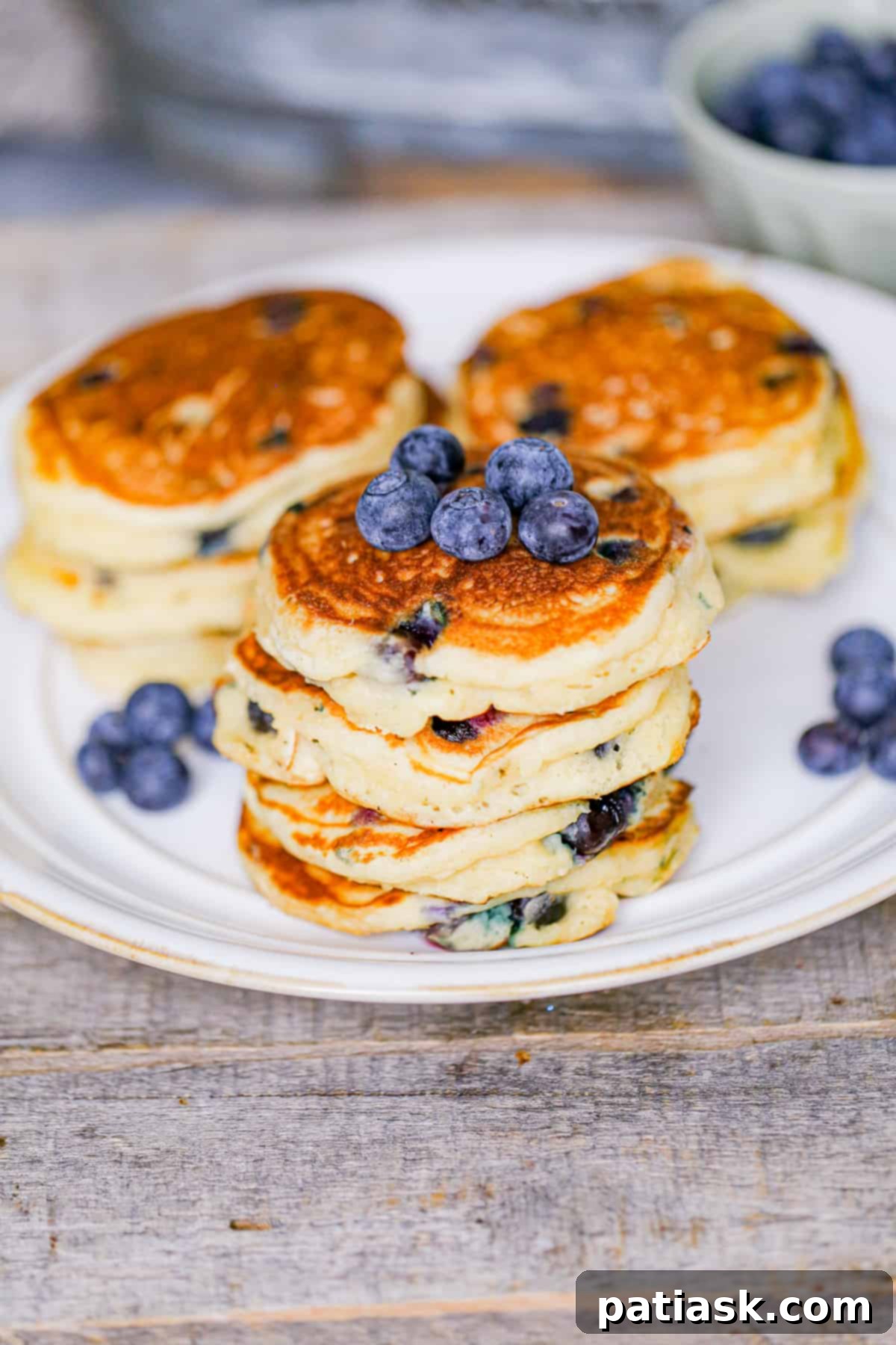 Plate of Fluffy Greek Yogurt Blueberry Pancakes