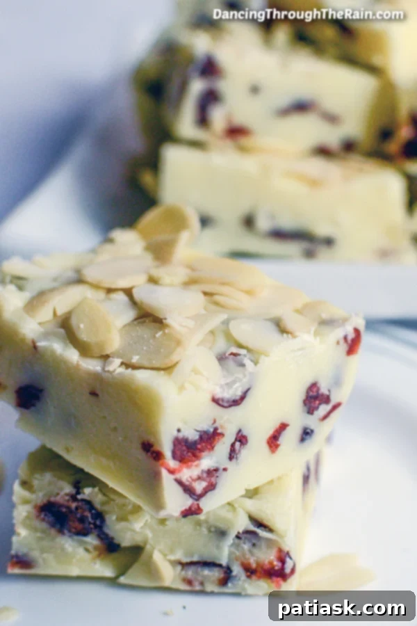 Creamy White Chocolate Cranberry Fudge studded with almonds