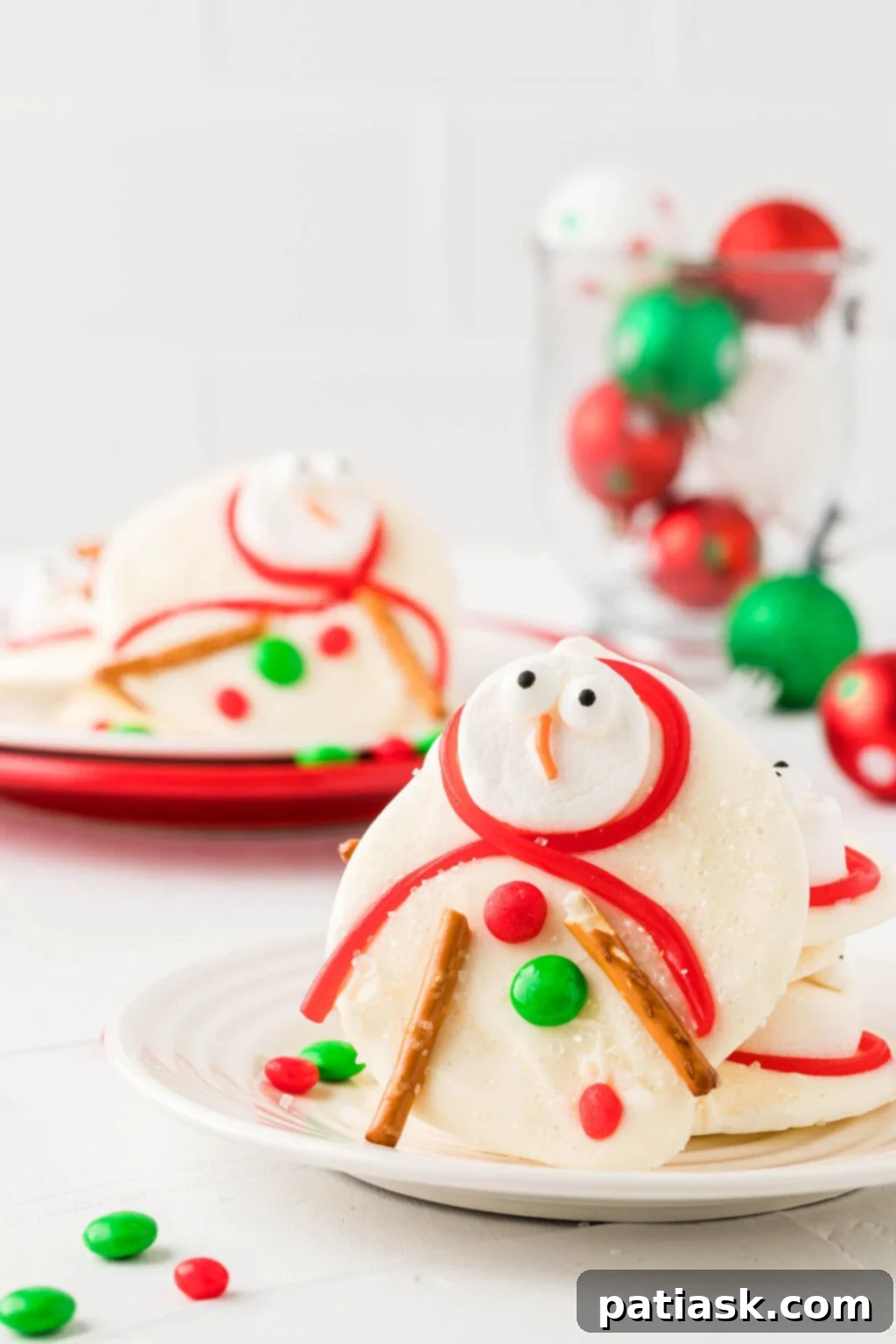 Close-up of Melted Snowman Cookie Bark with charming snowman details