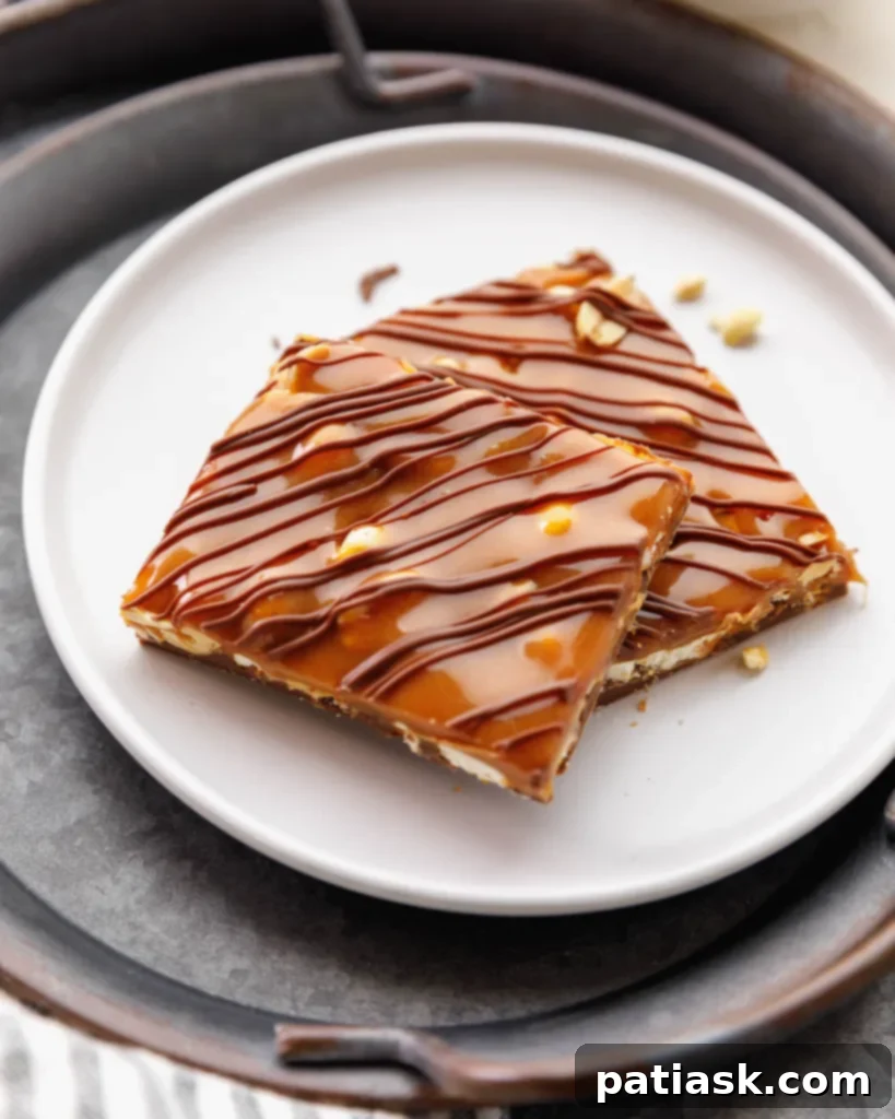 Decadent 5-ingredient No-Bake Caramel Pretzel Crack Bars with chocolate and peanuts