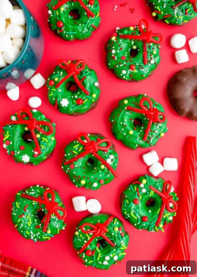 Cute and easy Christmas Wreath Cookies made with pinwheel cookies and Twizzlers